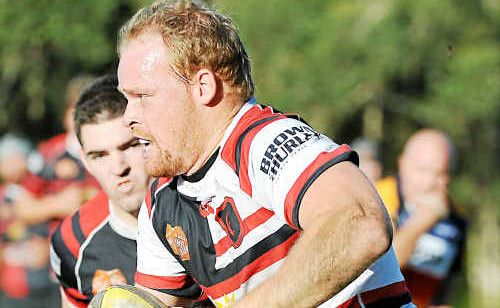 Coffs Breakers’ Kris Kent in full flight against Coffs Crushers. Coffs Breakers’ Kris Kent in full flight against Coffs Crushers.